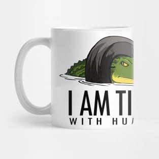 Crocodile trapped in tire Mug